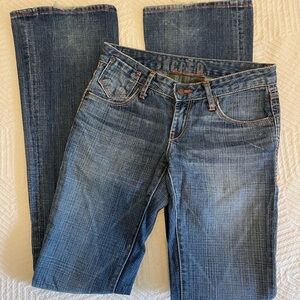 Women’s Sacred Blue low rise bootcut jeans with leather trim